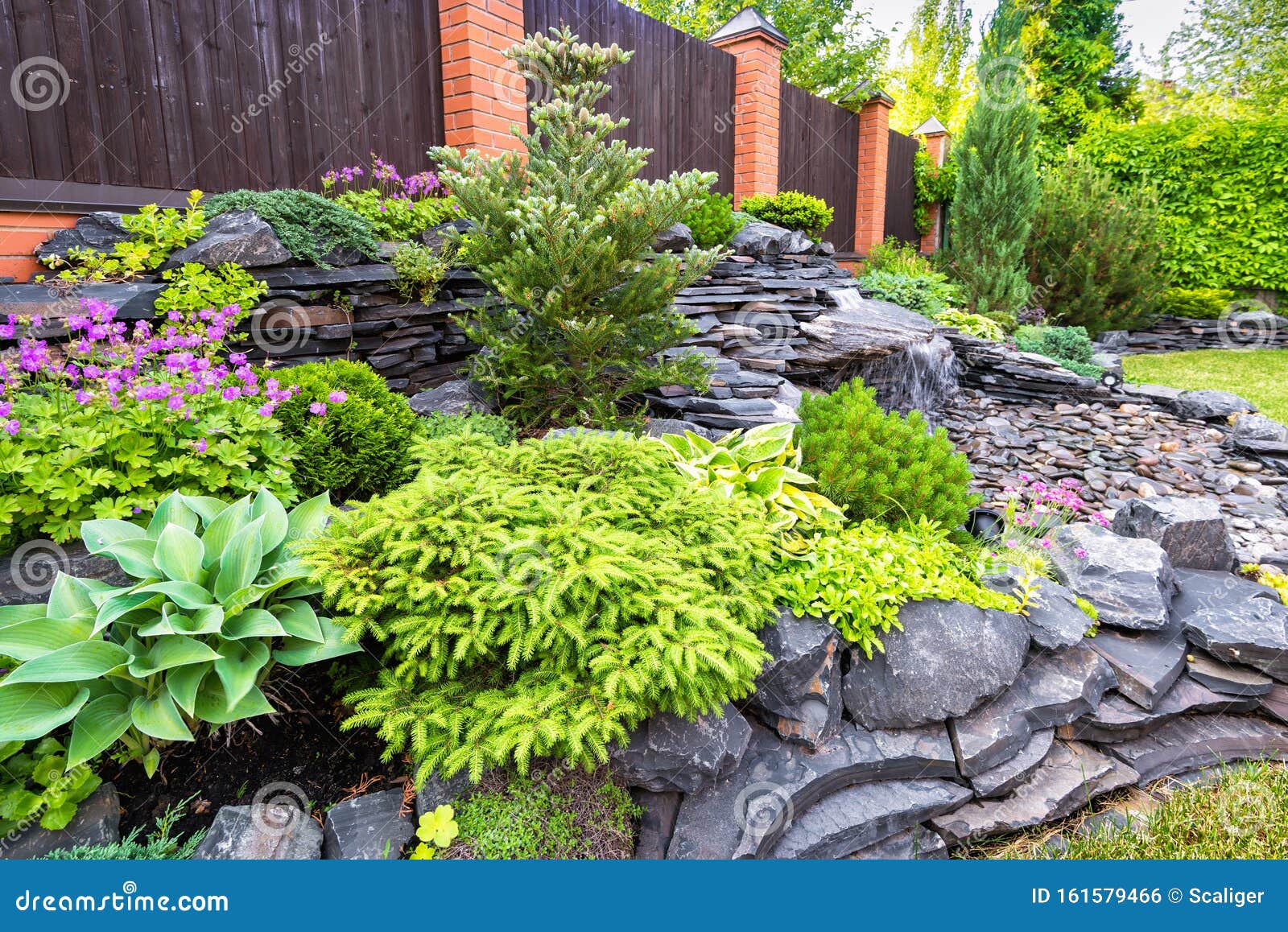 Natural Stone Landscaping In Backyard In Summer Stock Photo Image Of Garden