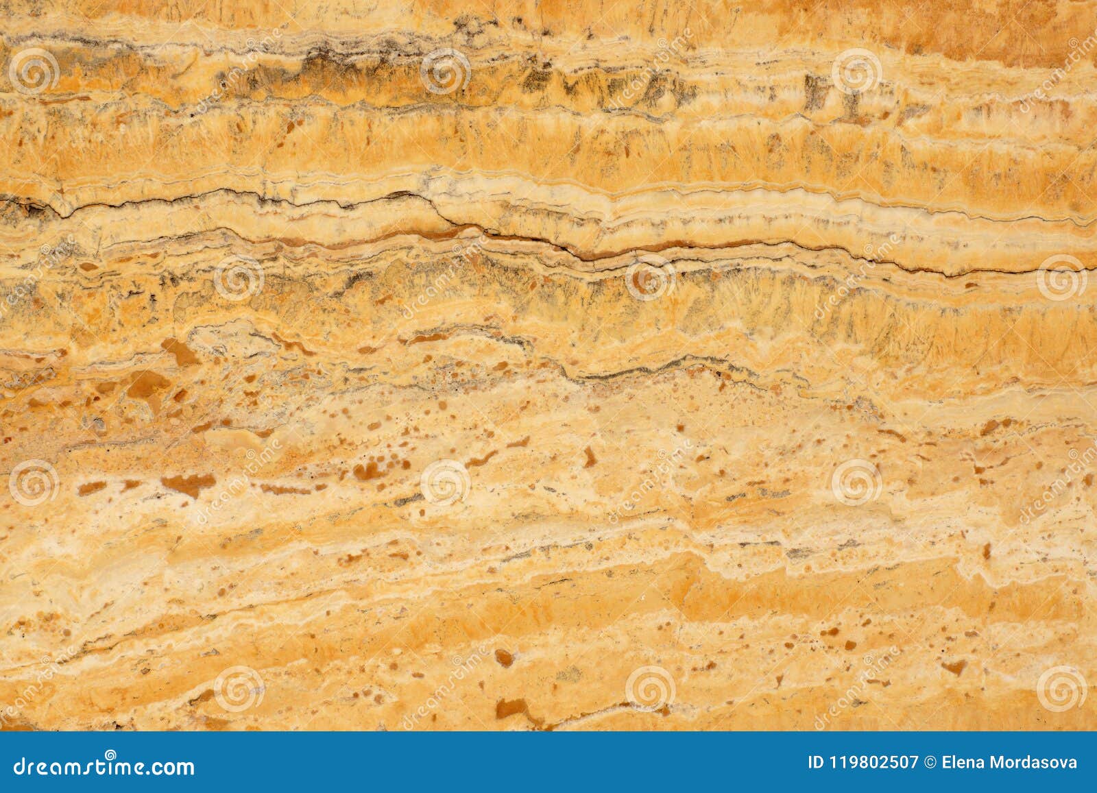 a natural stone, a polished yellow marble called travertino giallo