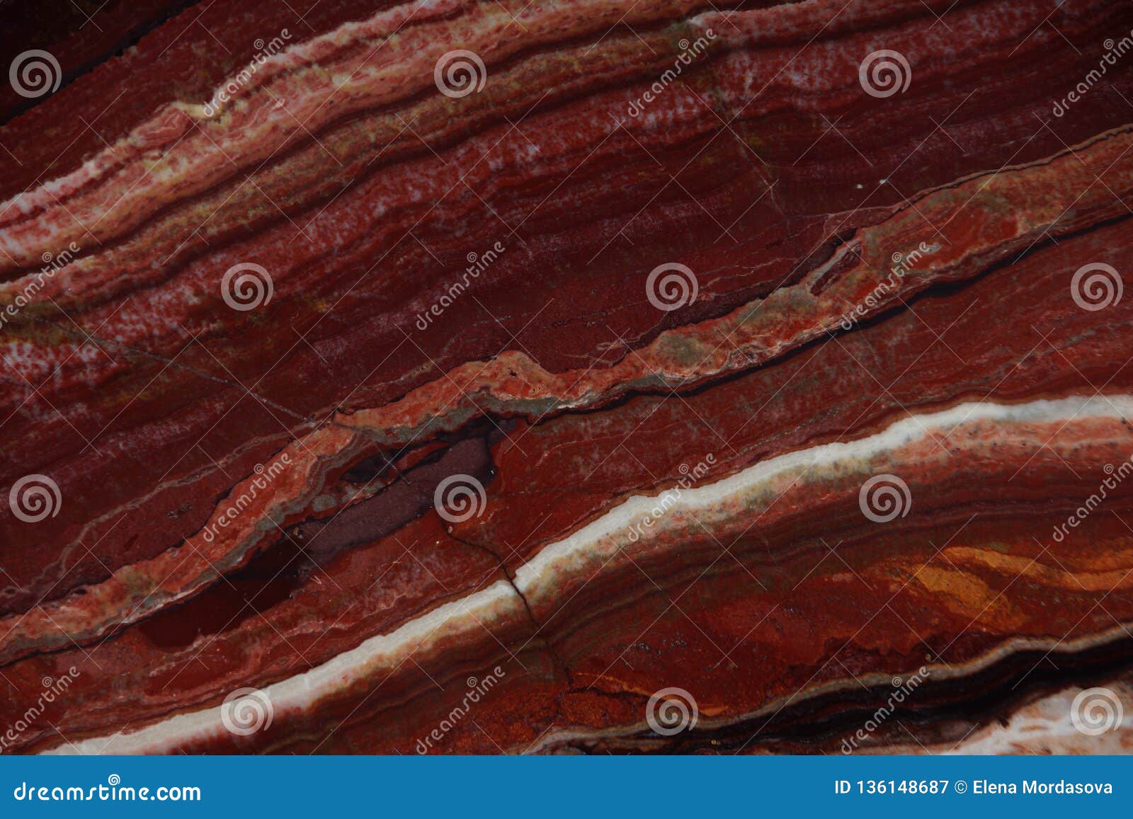 natural stone of red color with an interesting pattern called onice fantastico