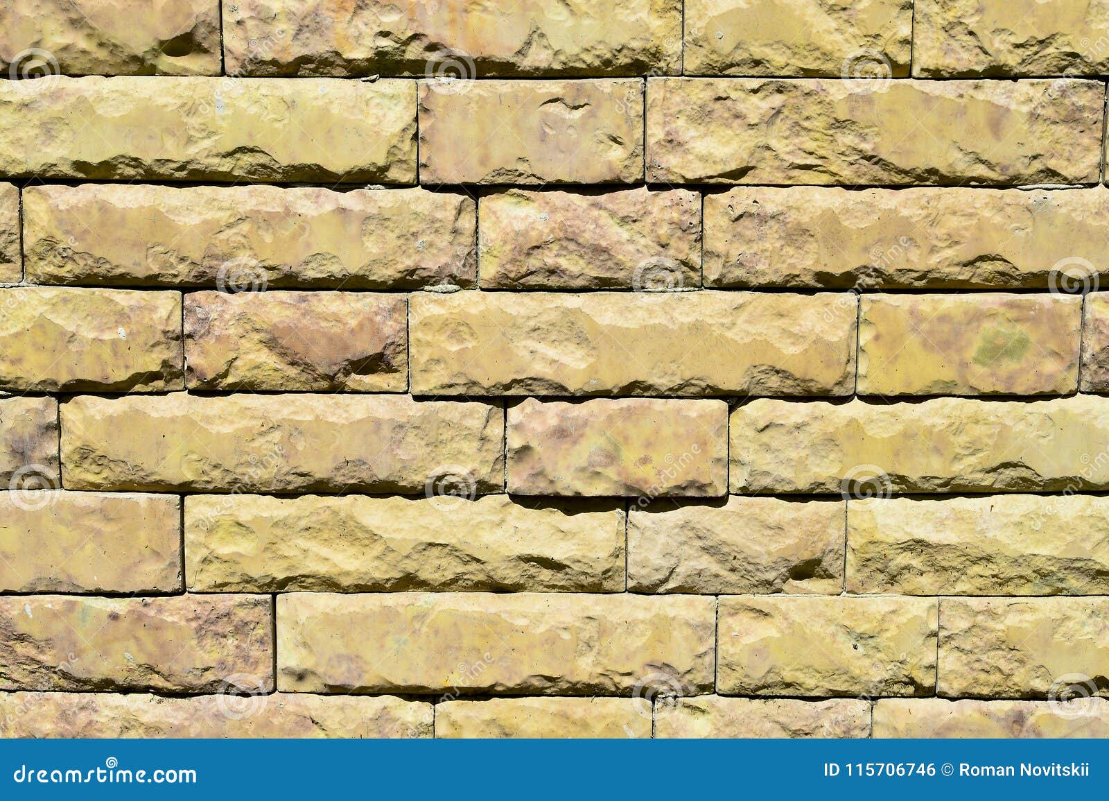 Natural Texture of a Large Light Yellow Brick.Background. Stock Photo