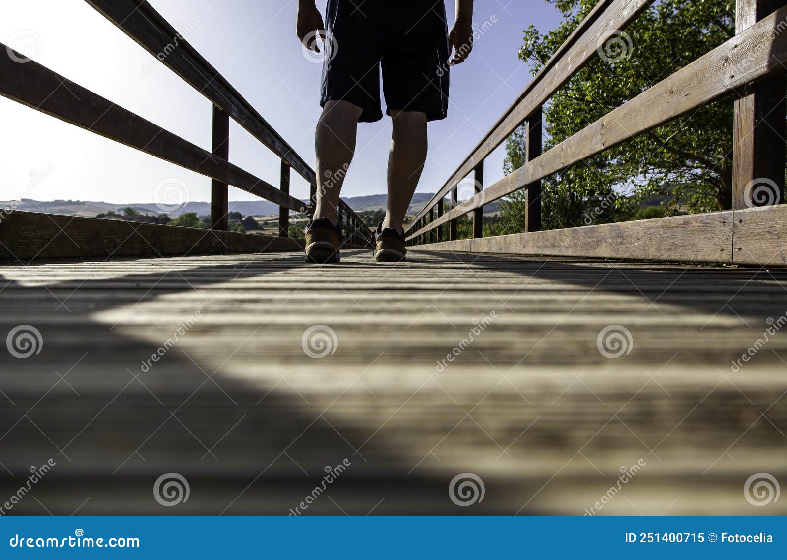 Man`s Feet on Wooden Walkway Stock Image - Image of outdoors, shoe ...