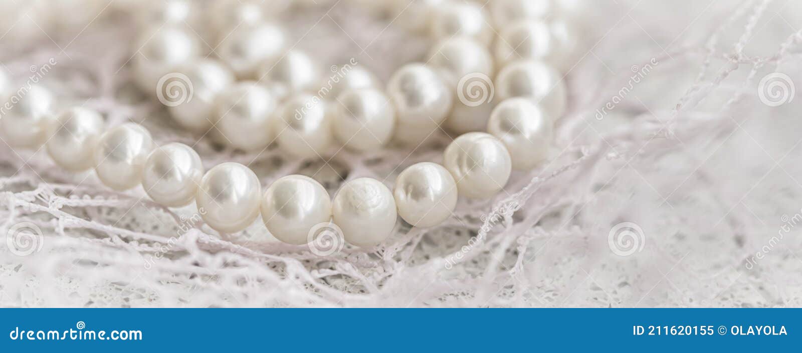 Nature White String of Pearls in Soft Focus, with Highlights Stock