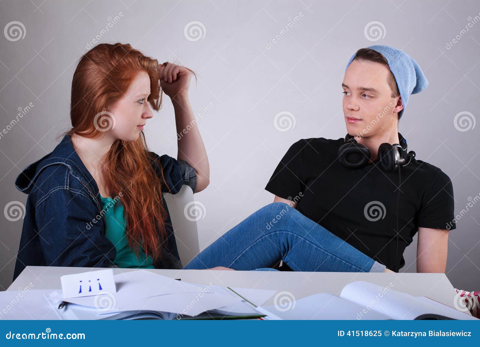 Naughty Teenagers Talking In Classroom Stock Photo Image