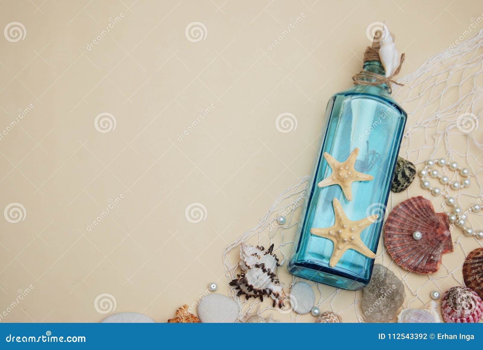 Nautical Theme Backdrop, Decorative Bottle with Shells, Starfish on Neutral  Ivory Background. Place for Text. Selective Focus. Stock Photo - Image of  neutral, exotic: 112543392