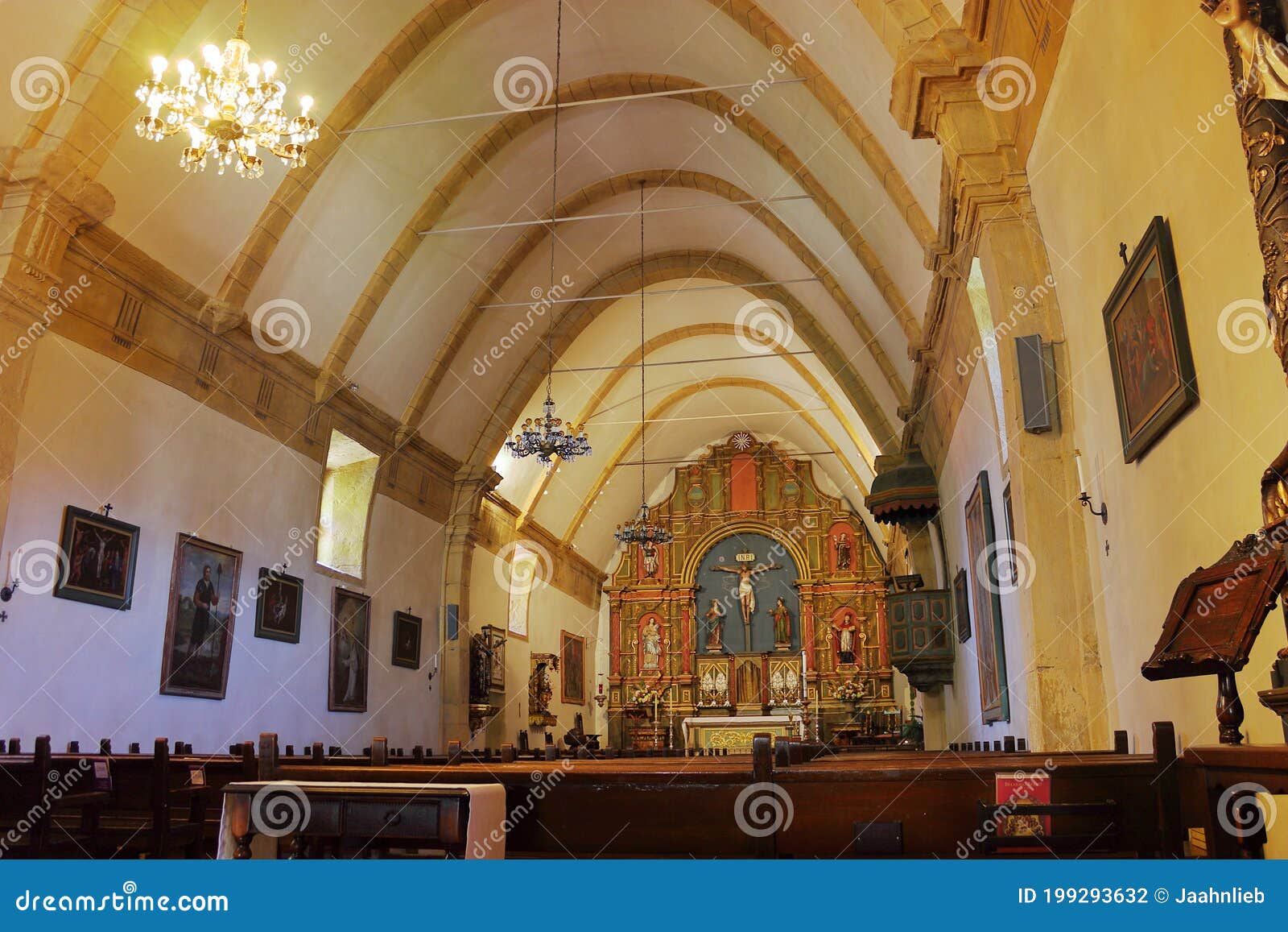 nave of historic spanish mission church at carmel, big sur, california