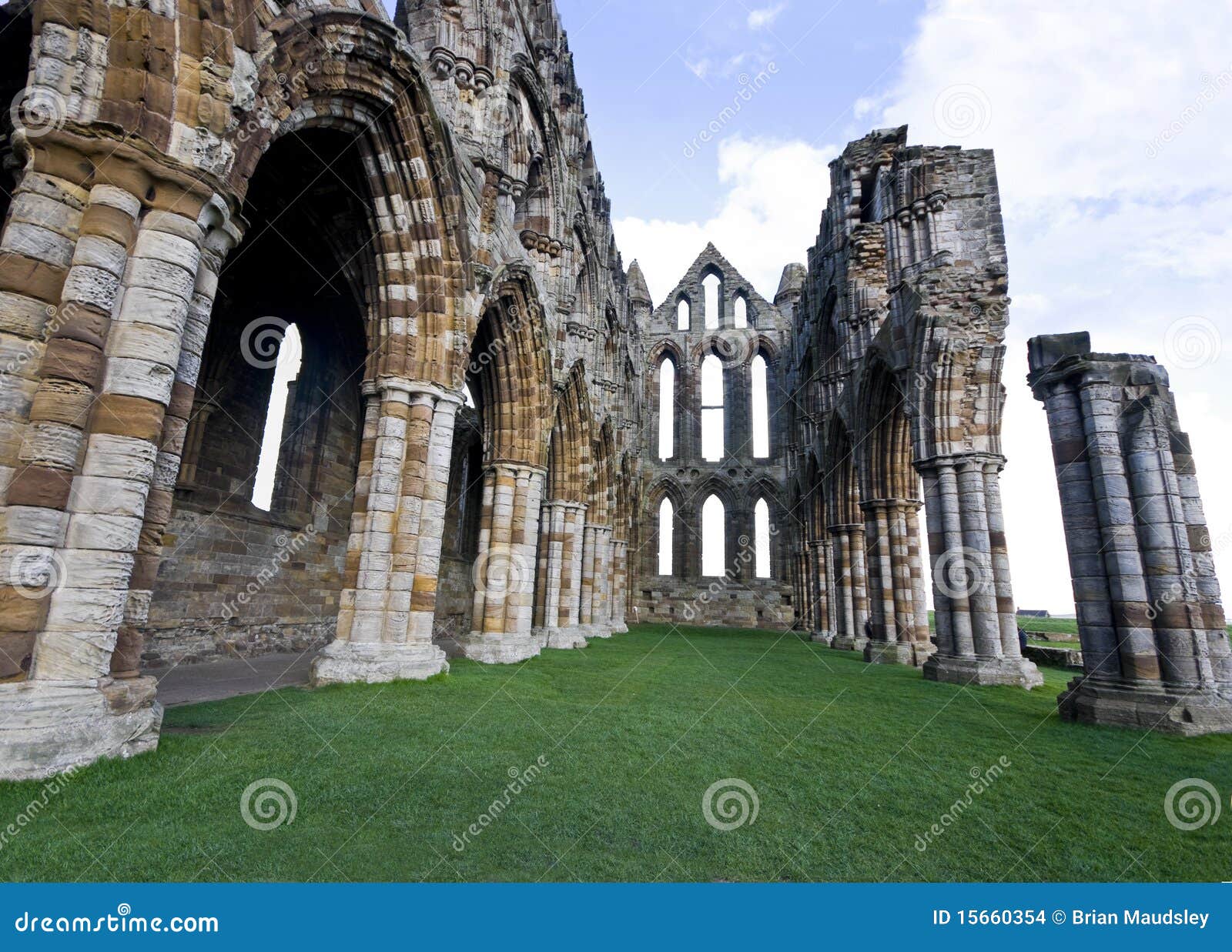 the nave of the ruined whitby abbey, england.