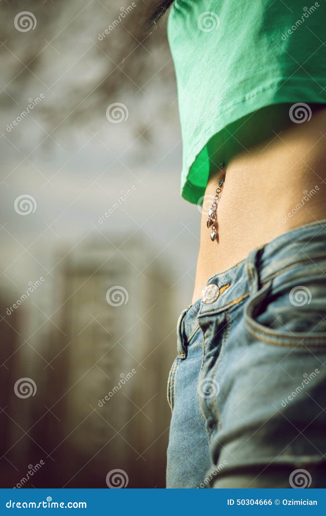Navel piercing close up stock photo. Image of model, ring 50304666