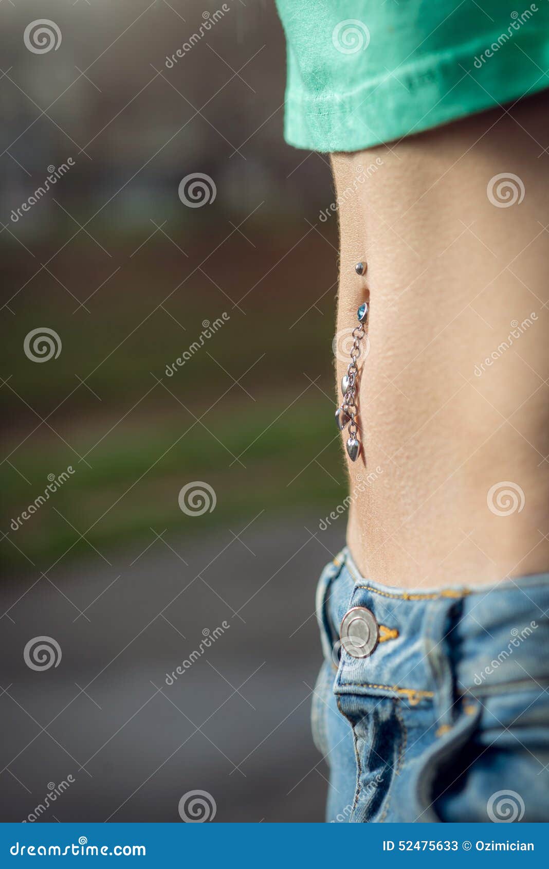 Navel piercing close up stock image. Image of button 52475633