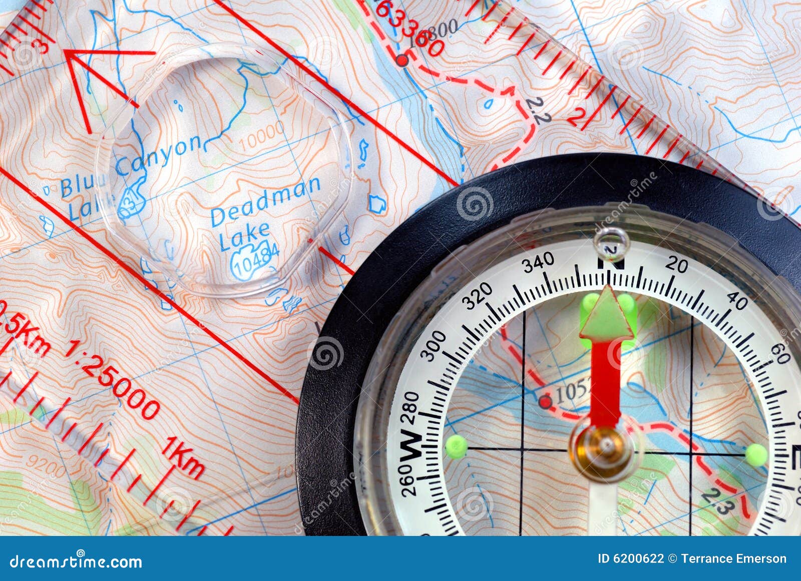 navigational compass on topographical map