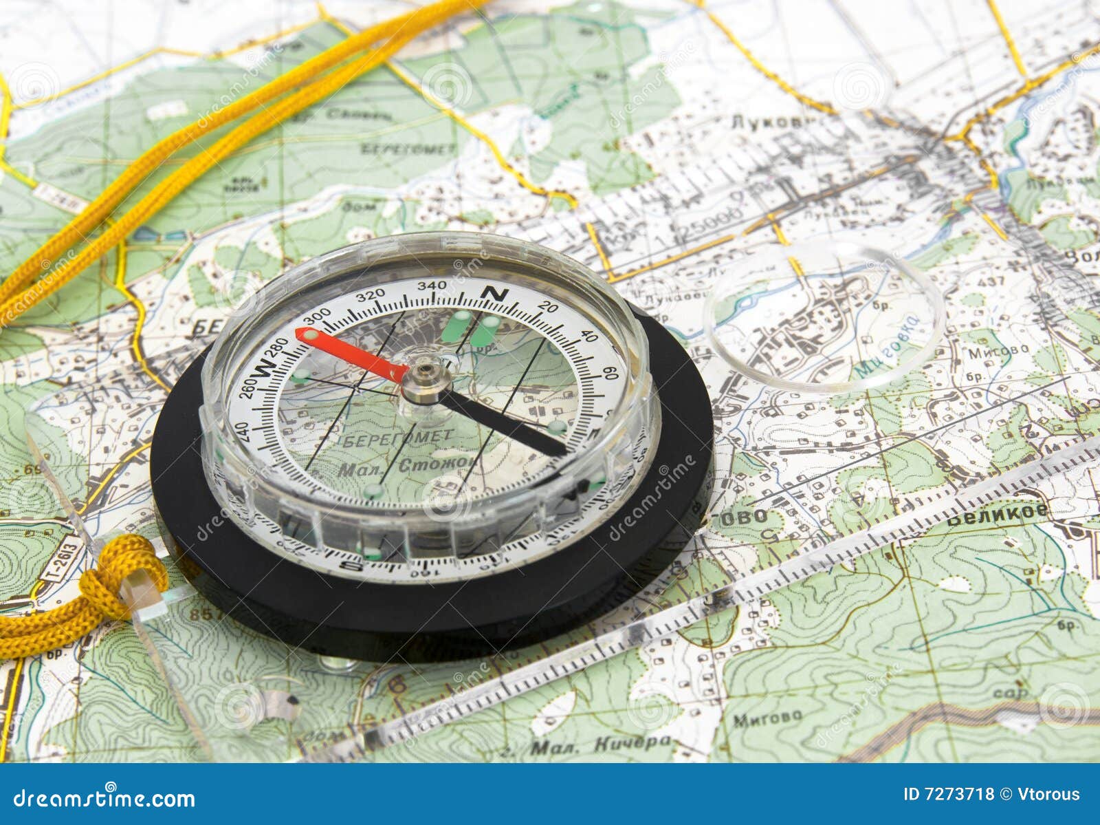 navigational compass on topographical map