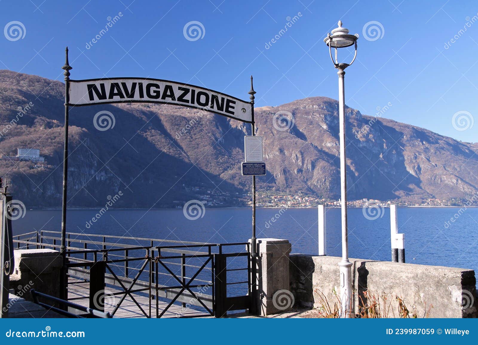 the navigazione sign on the ferry boat boarding zone docking of abbadia lariana on como lake