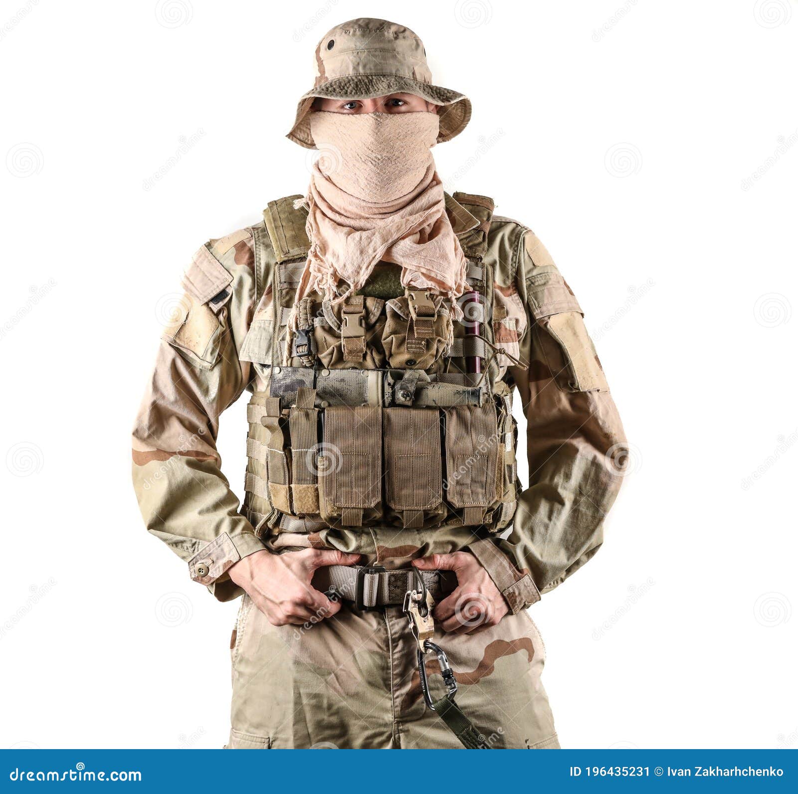 Navy Seal Specialist in Combat Gear with His Hands on His Belt Posing