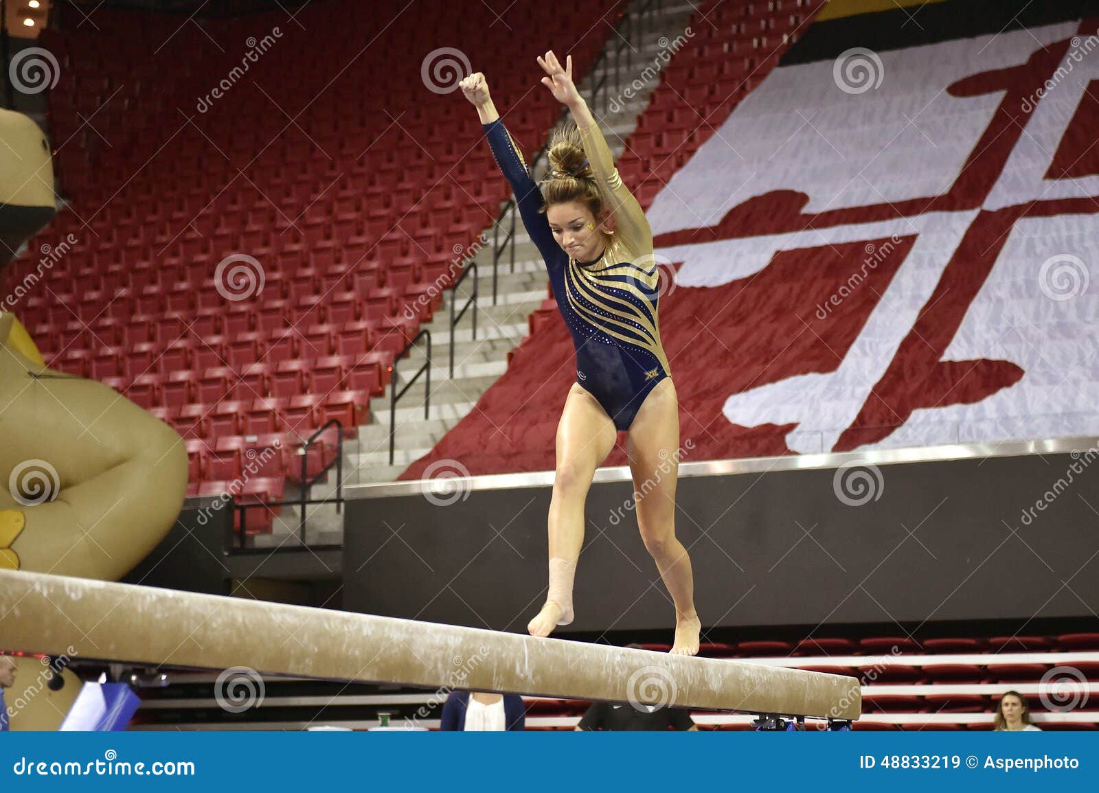 2015 NCAA Ladies Gymnastics - WVU. COLLEGE PARK, MD - JANUARY 9: WVU gymnast Mackenzie Myers performs on the balance beam during a meet January 9, 2015 in College Park, MD.