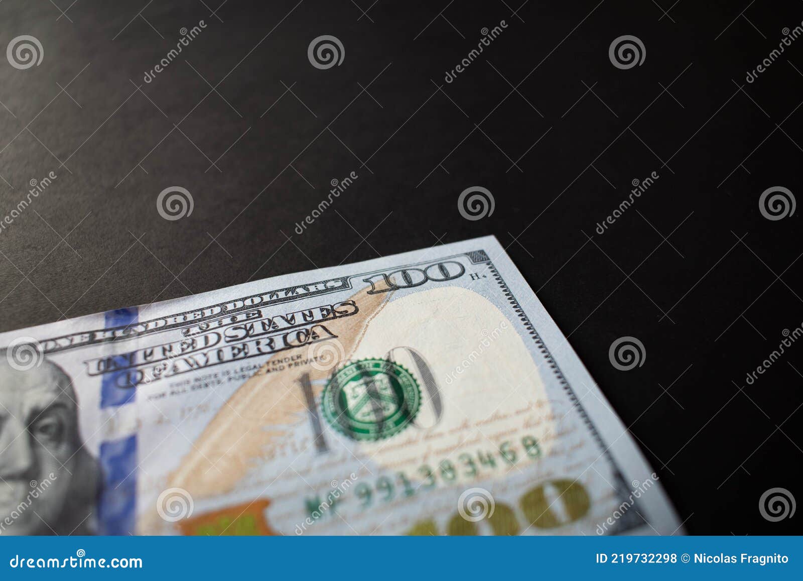 ne hundred dollar bill on black background