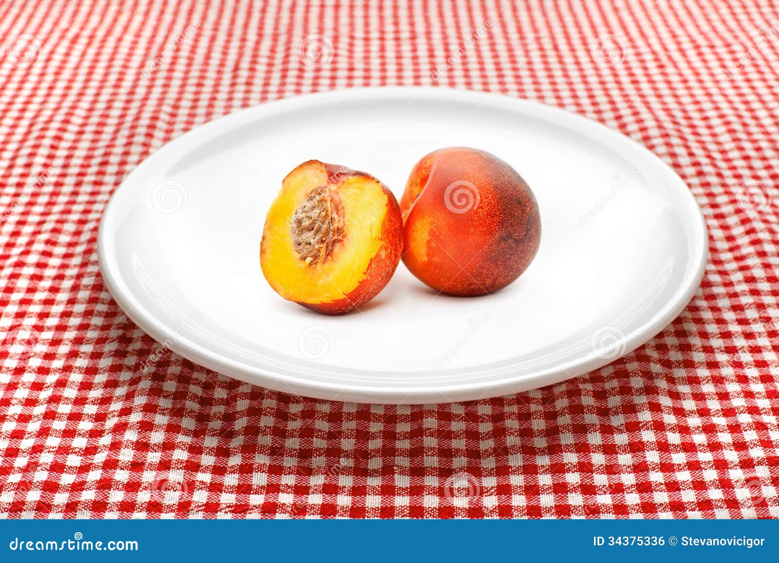 Nectarine on plate stock photo. Image of diet, agriculture 34375336