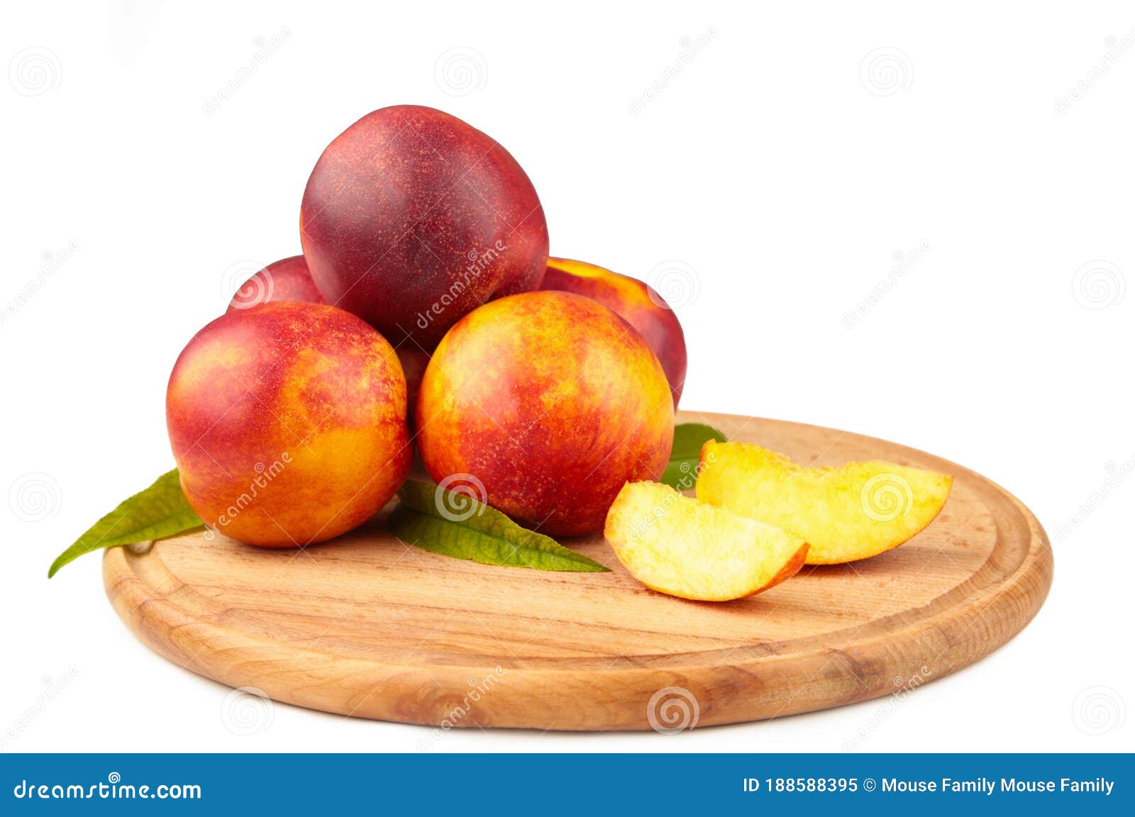Nectarines on a Cutting Board Isolated on White Background Stock Image