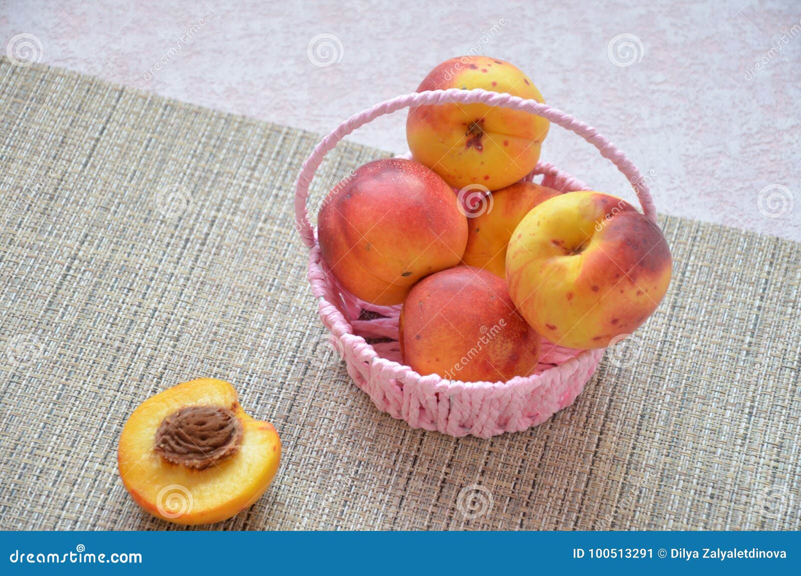 Nectarines and Peaches in Backet. Peach, Nectarine Cut in Half Stone