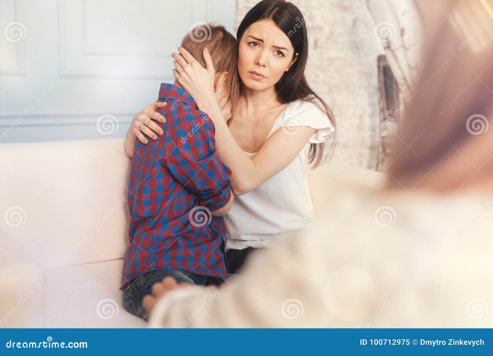 Troubled Mother and Her Son Talking with a Psychologist Stock Image ...