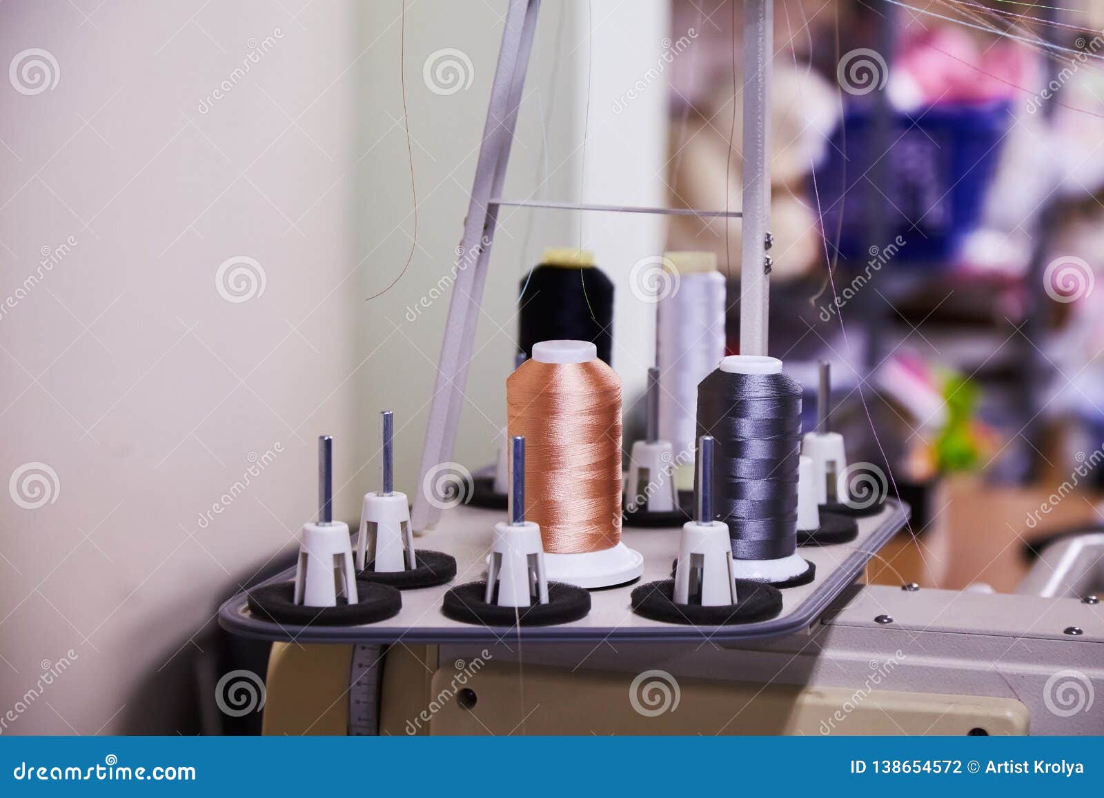 12 Needle Compact Embroidery Machine. Industrial Embroidery Stock Photo