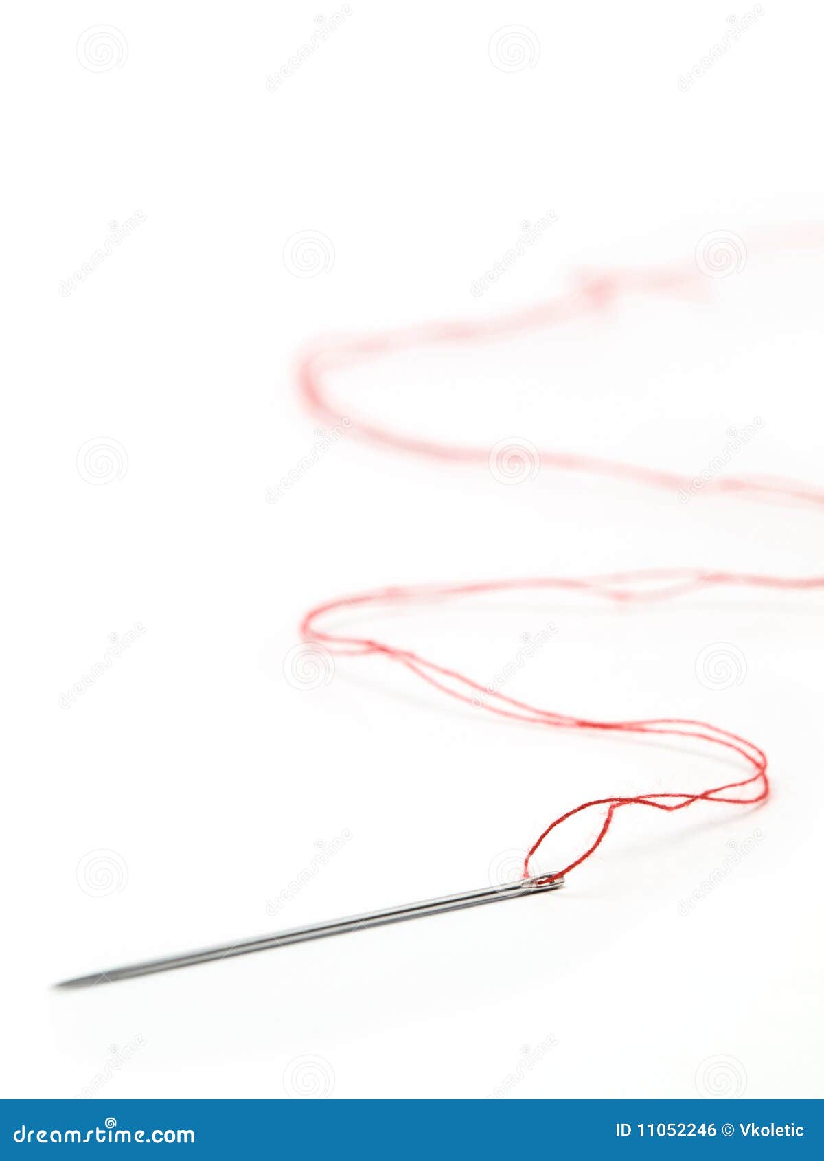 Needle with the red thread stock photo. Image of color - 11052246
