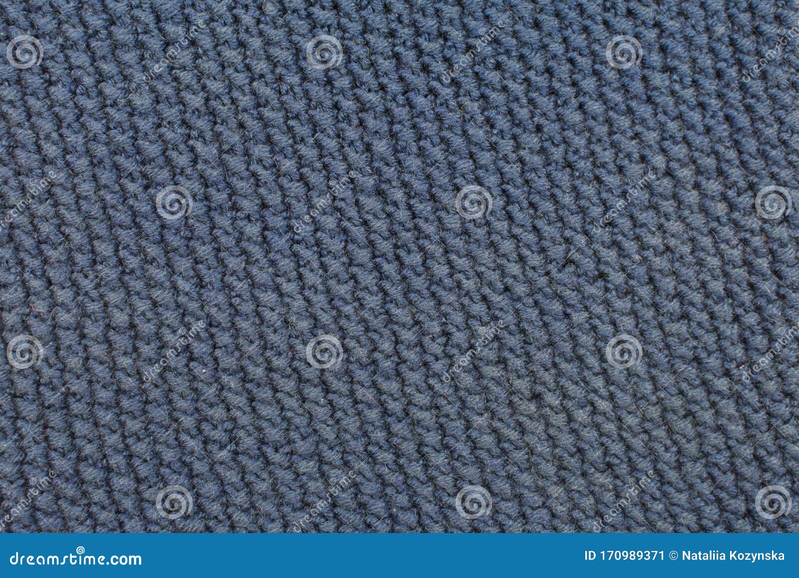 Needlework, Hobbies, Knitting. Background Textile Fabric with a Knitted Texture Wool Blue Stock