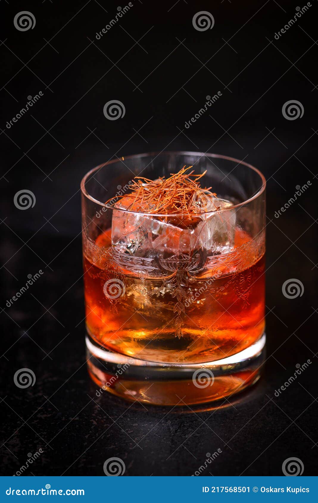 Negroni with Big Ice Cube and Saffron on Top in Vintage Glass Stock Image -  Image of vintage, whiskey: 217568501