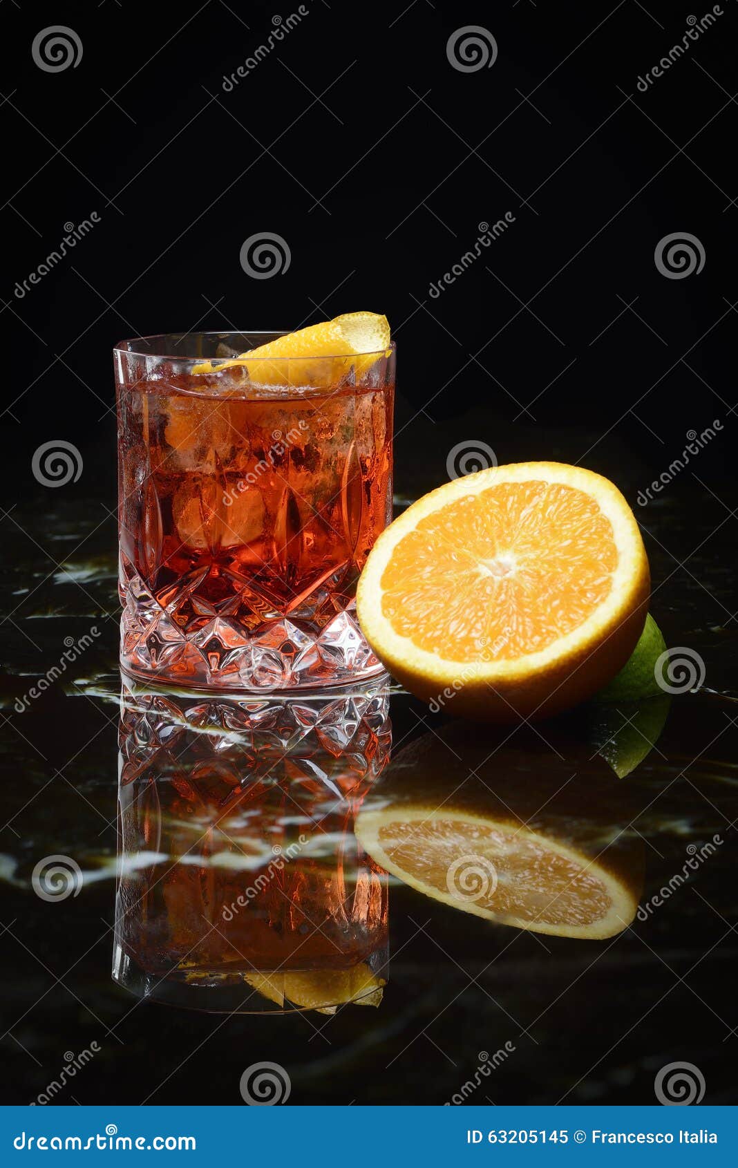 Negroni with Big Ice Cube and Saffron on Top in Vintage Glass Stock Image -  Image of vintage, whiskey: 217568501