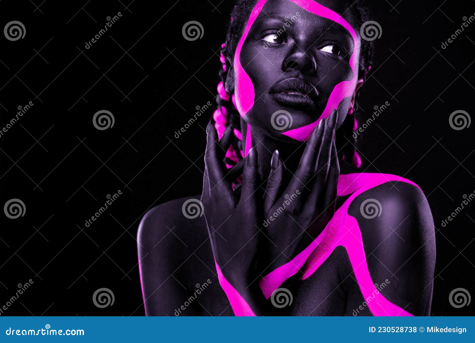 Neon colors. Pink and black body paint. Woman with face art. Young