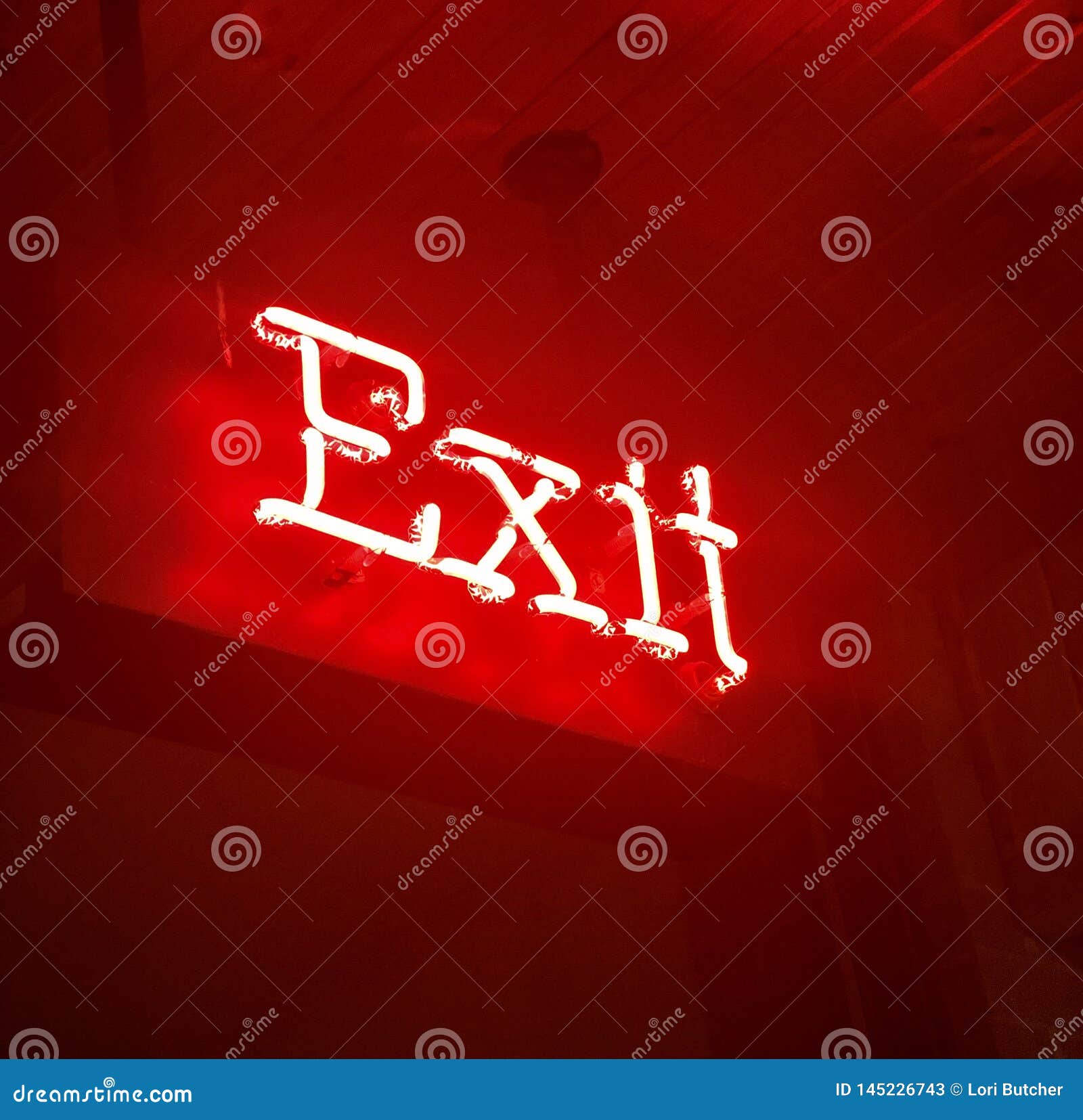 Neon exit sign stock image. Image of doorway, lighted 145226743