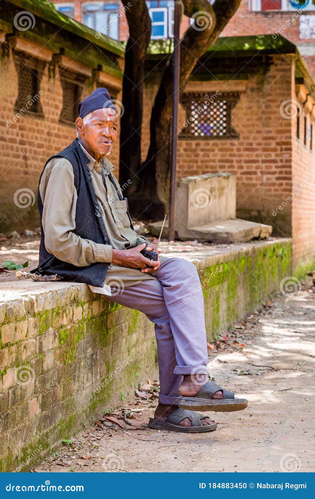 Nepali Old Man Listening To Radio Editorial Image - Image Of Clothing,  Colorful: 184883450