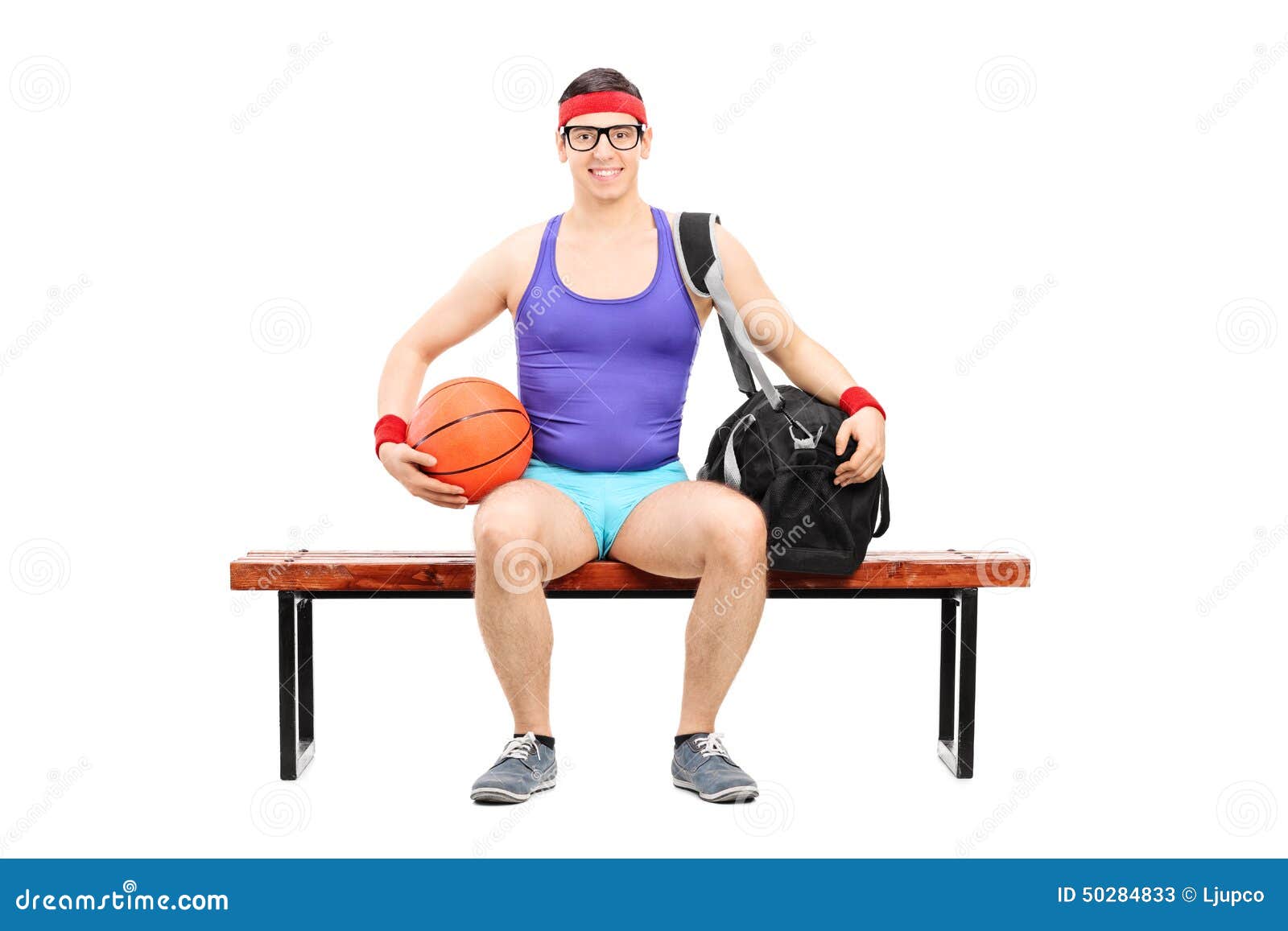 Nerdy Athlete Holding a Basketball Seated on a Bench Stock Image ...