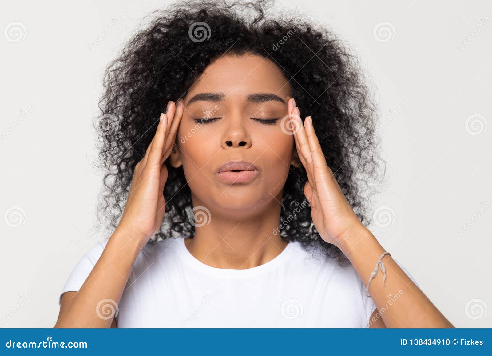 nervous african woman breathing calming down trying to relieve stress