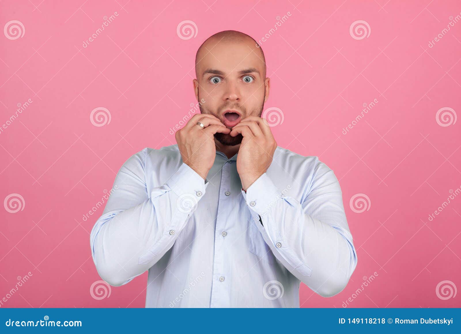 nervous scared fellow bite finger nails, look anxiously at camera, being frightened of something terrific, express negative emotio