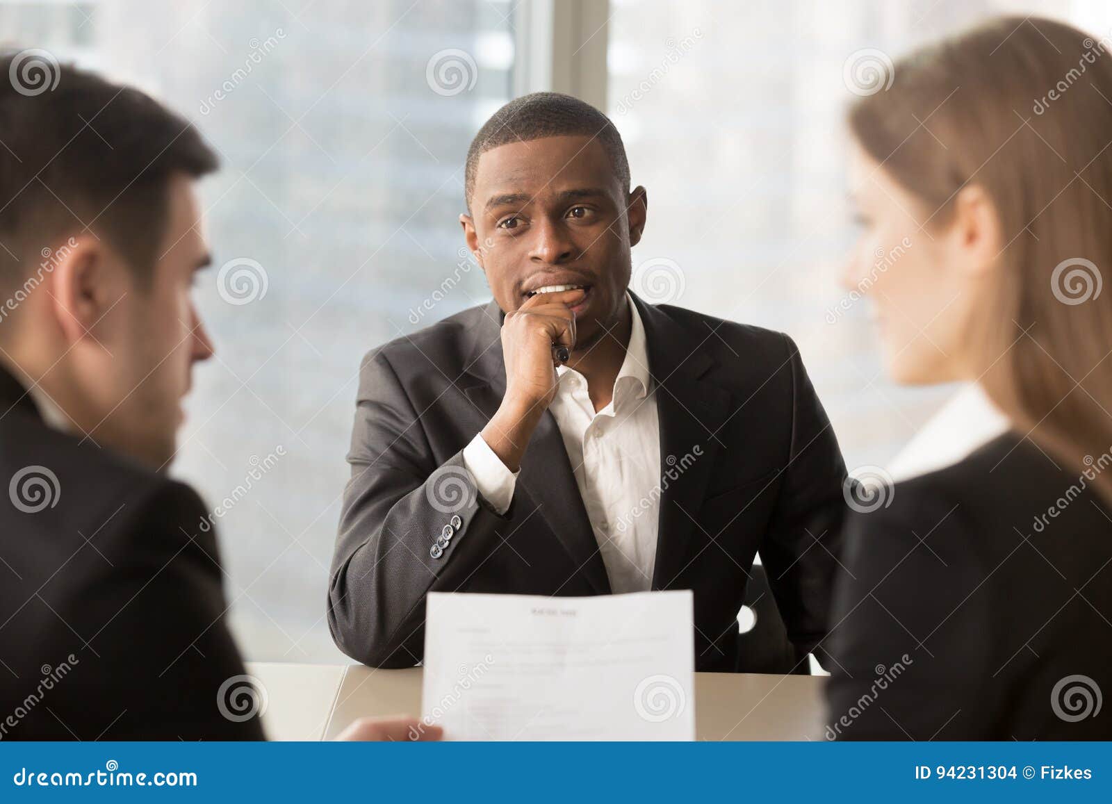nervous worried unhired african-american job applicant waiting f
