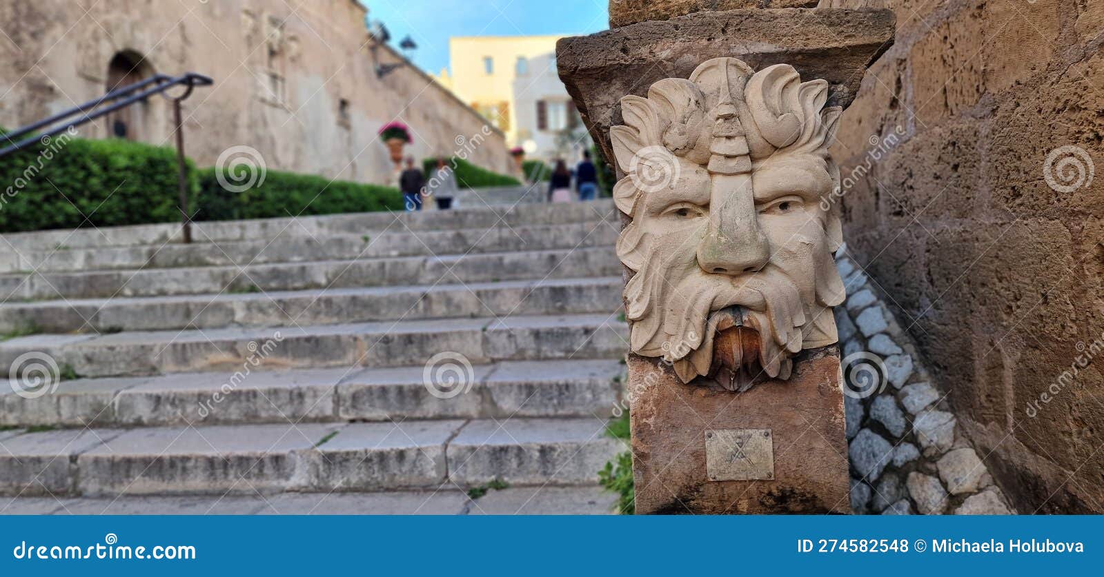 mascaron adorning the palace's staircase