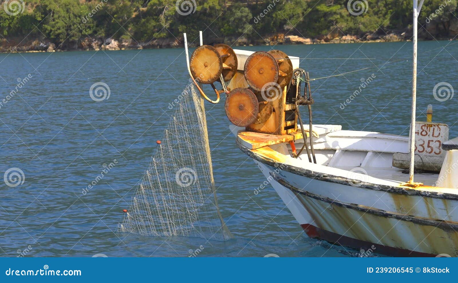 Net Reel on Small Fishing Boat Pulling Net Stock Video - Video of