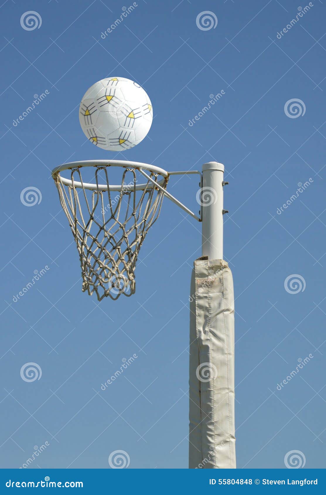 Netball goal ring and net against a blue sky and clouds with quote Stock  Photo | Adobe Stock
