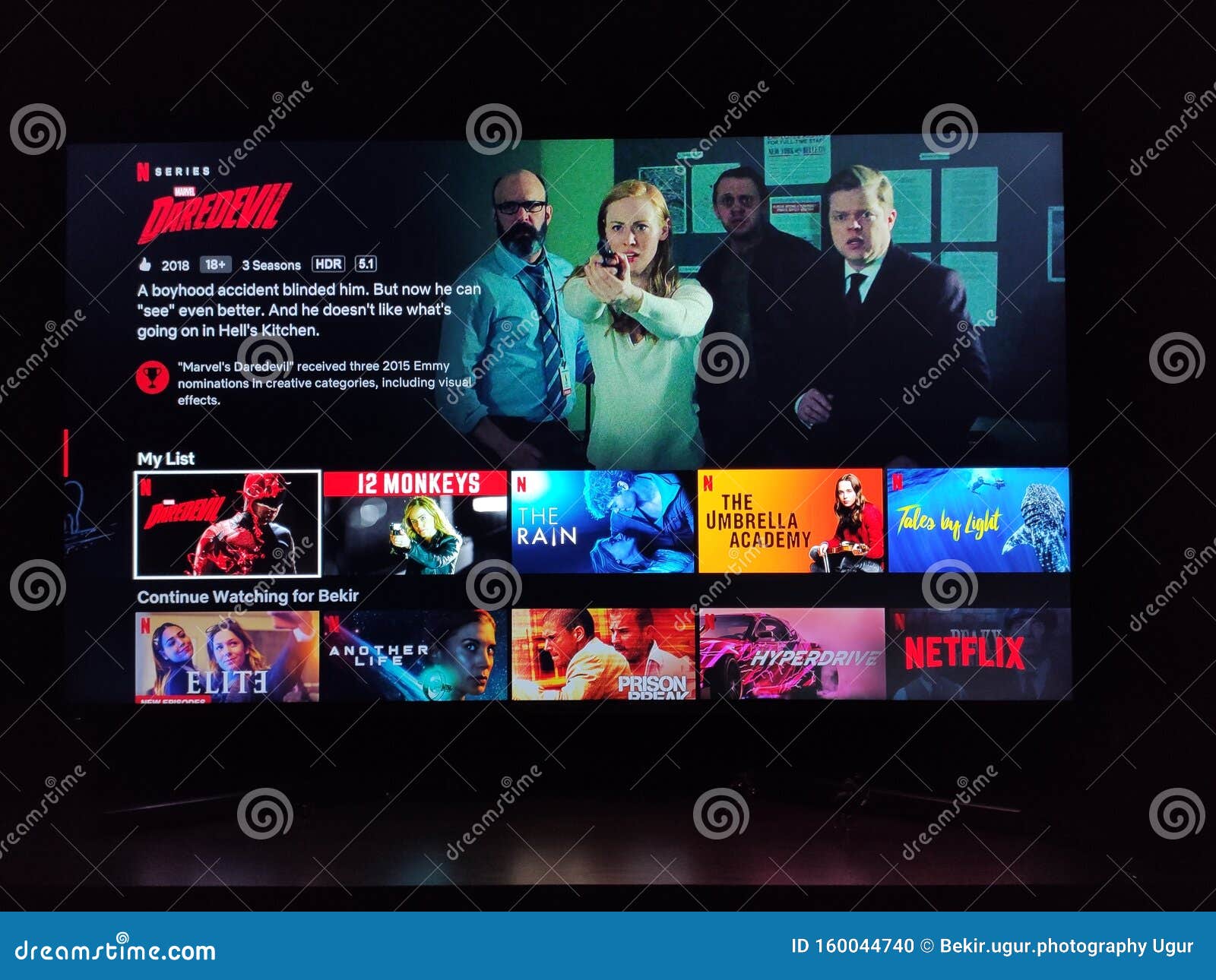 Netflix App on Tv Screen Playing and the `Daredevil` Series Logo Behind