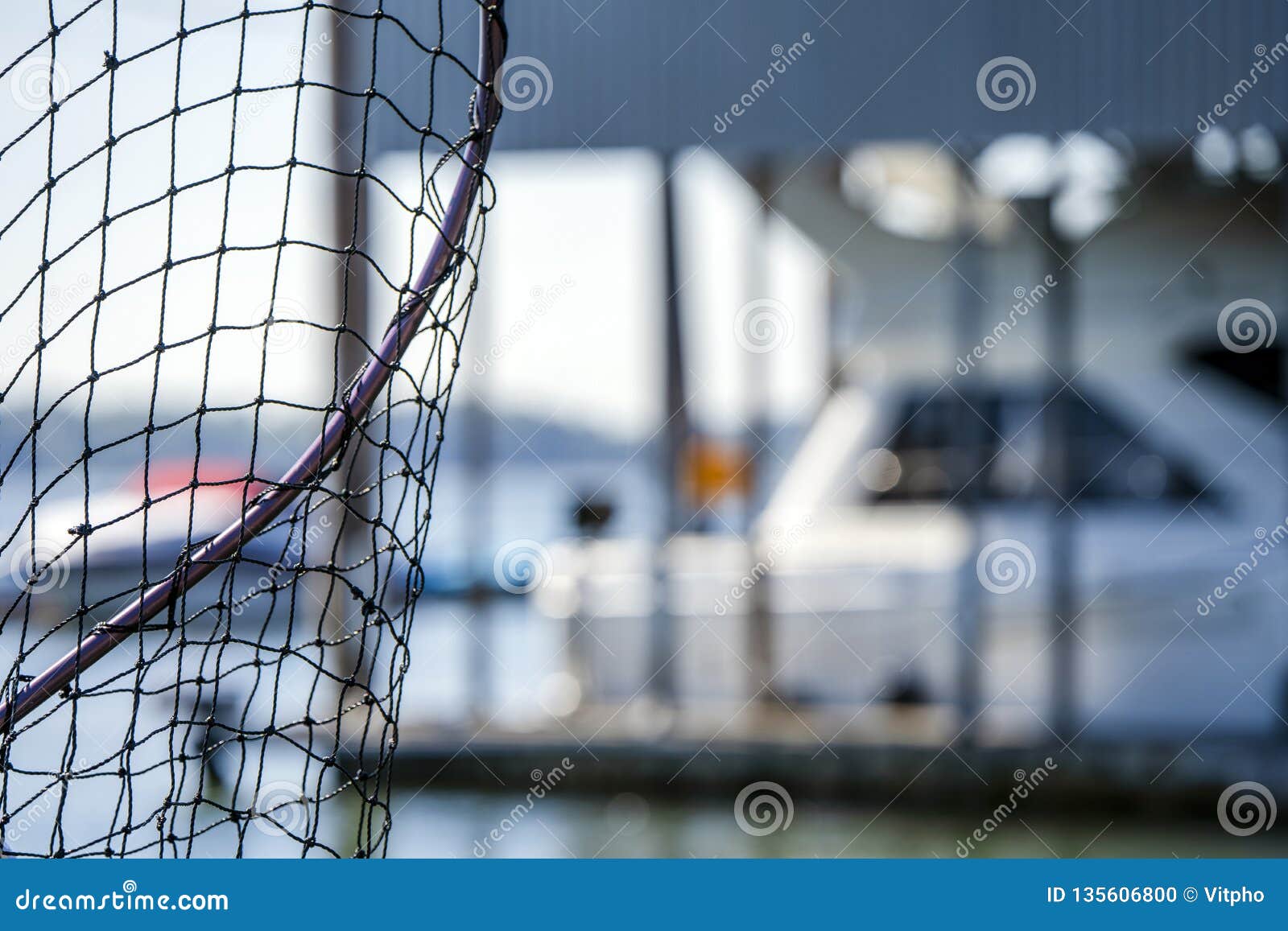 https://thumbs.dreamstime.com/z/netting-net-fishing-bay-catching-fish-made-wicker-mesh-worn-metal-frame-handle-ease-use-against-135606800.jpg