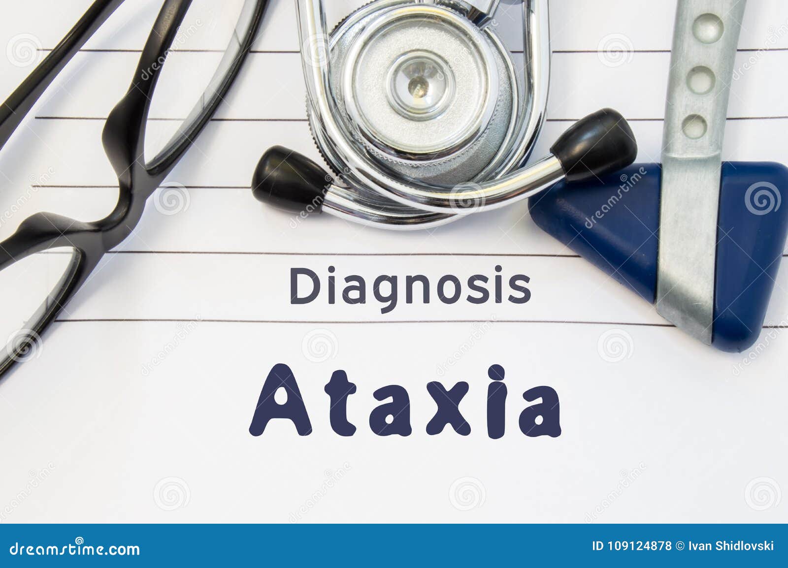 neurological diagnosis of ataxia. neurological hammer, stethoscope and doctor`s glasses lie on doctor workplace on sheet of notebo