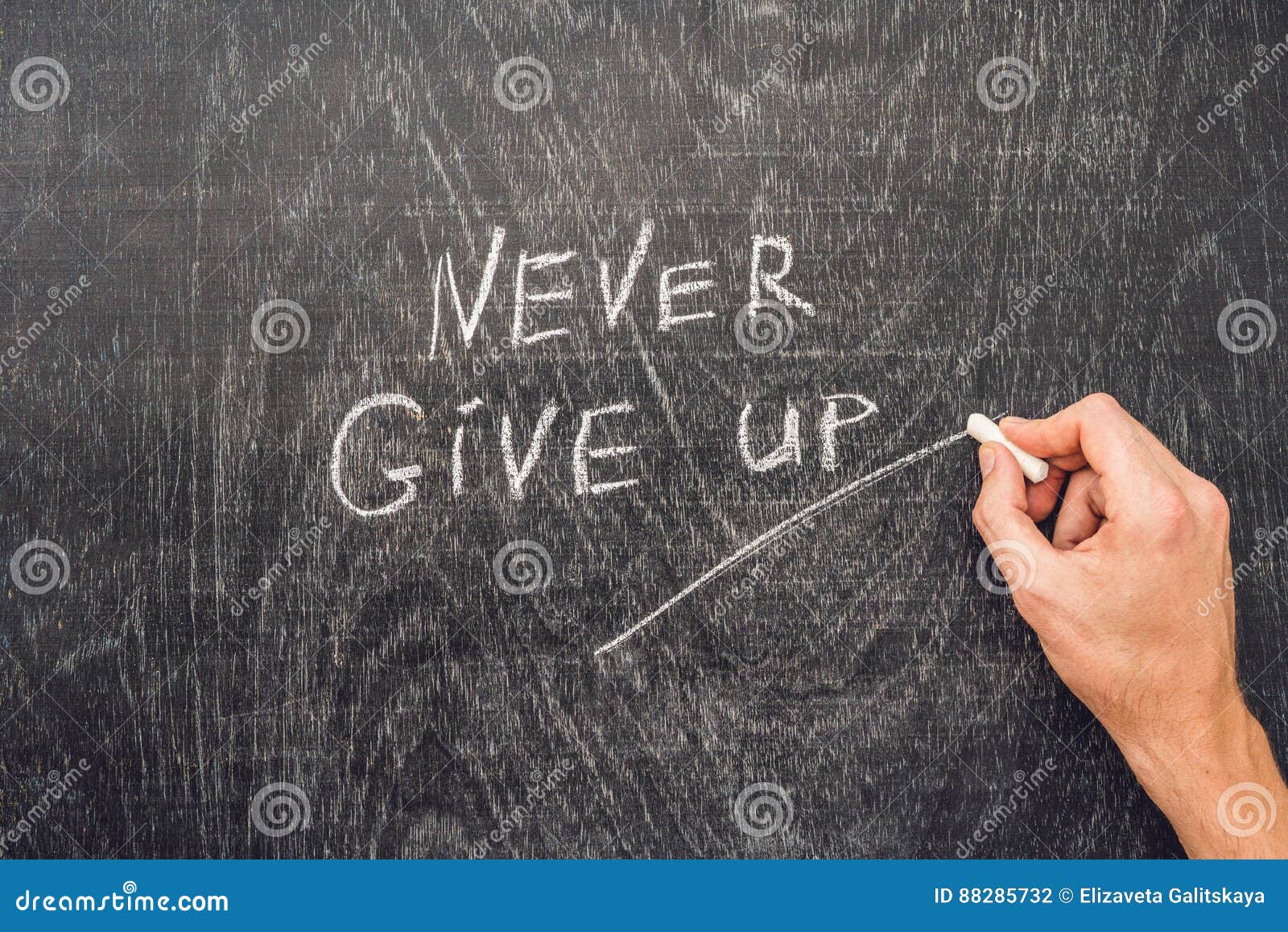 Never Give Up Words Written on the Chalkboard Stock Photo - Image of