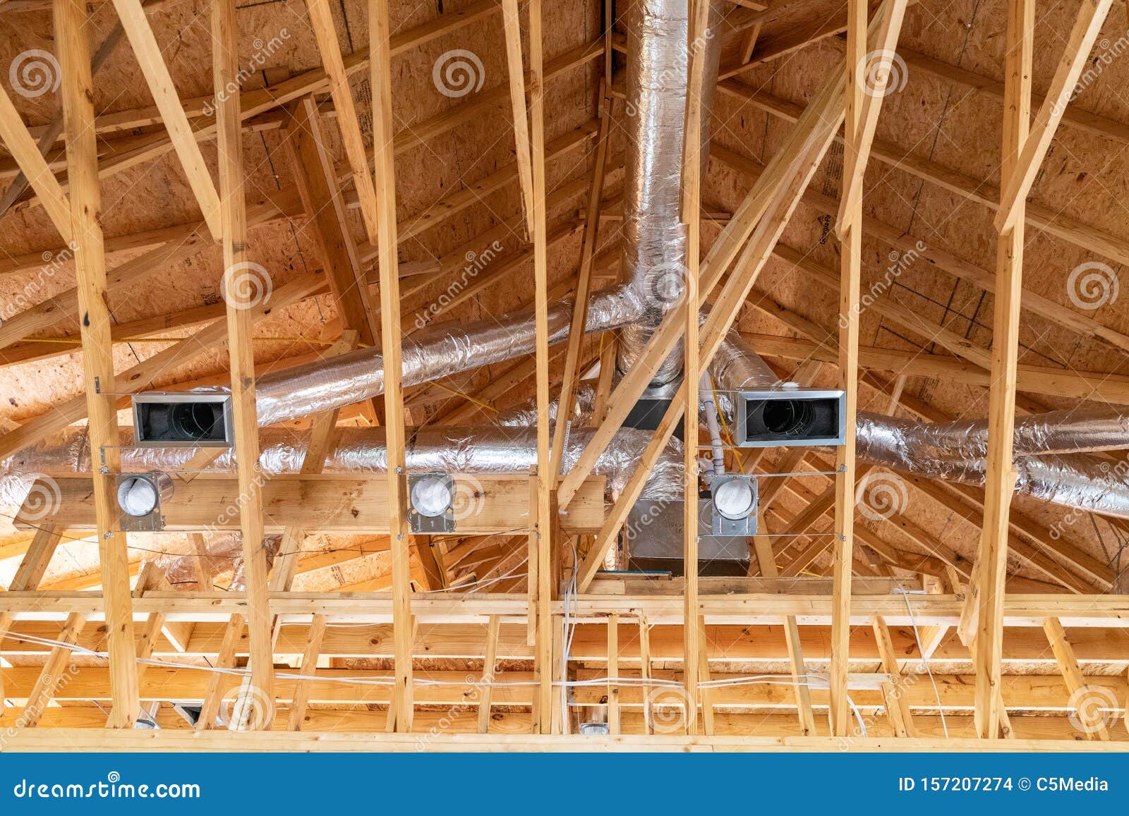 New Air Conditioner Ductwork In New Home Construction Stock Photo