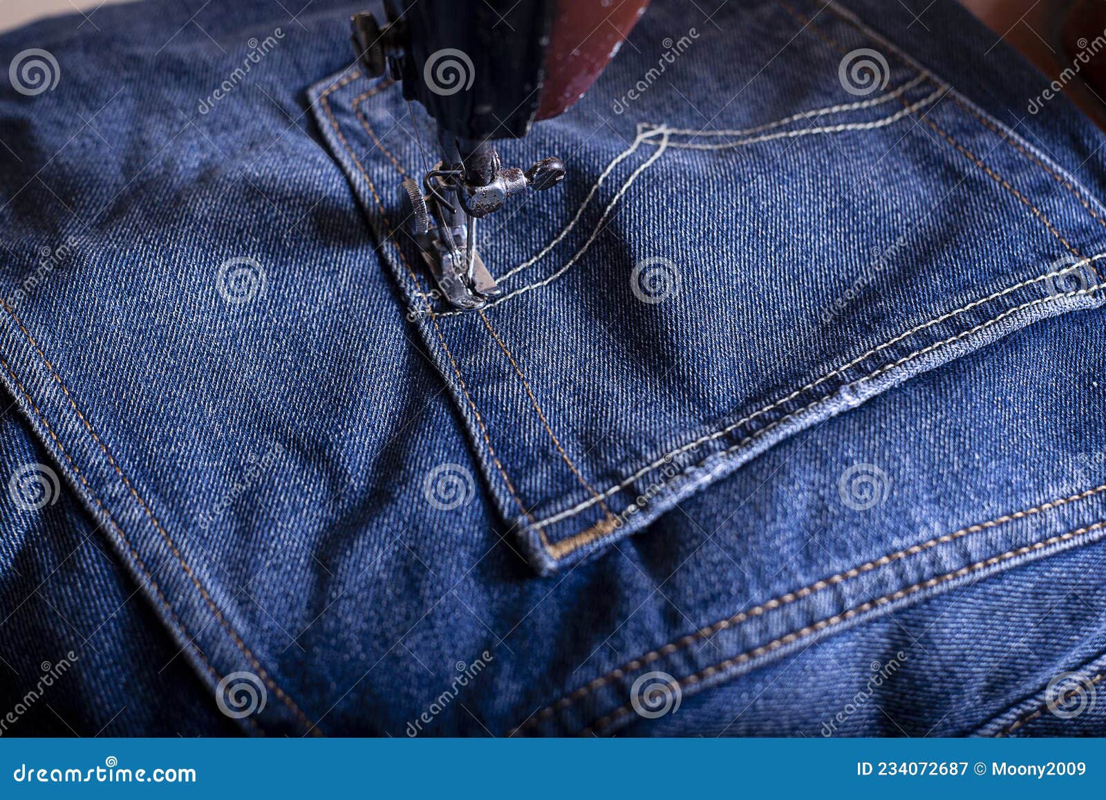 Jeans sewing on machine stock image. Image of factory 234072687