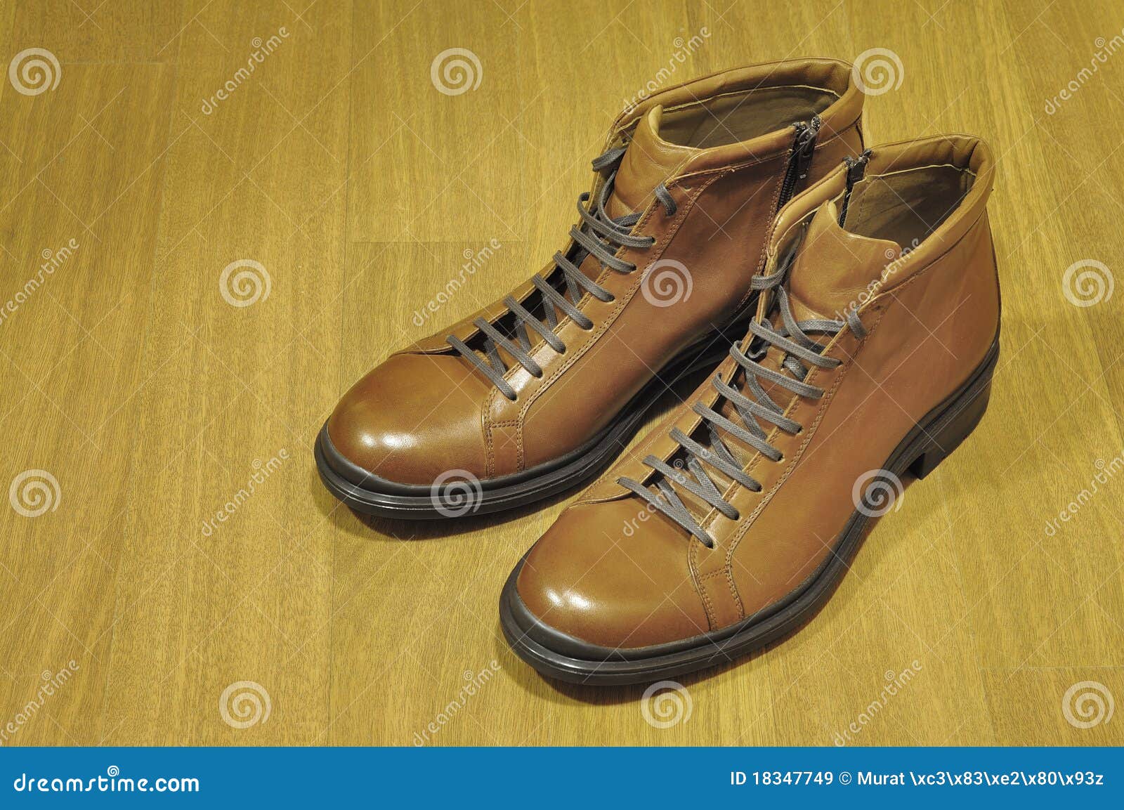 New Boots on a Wooden Floor Stock Image - Image of leather, shoe: 18347749