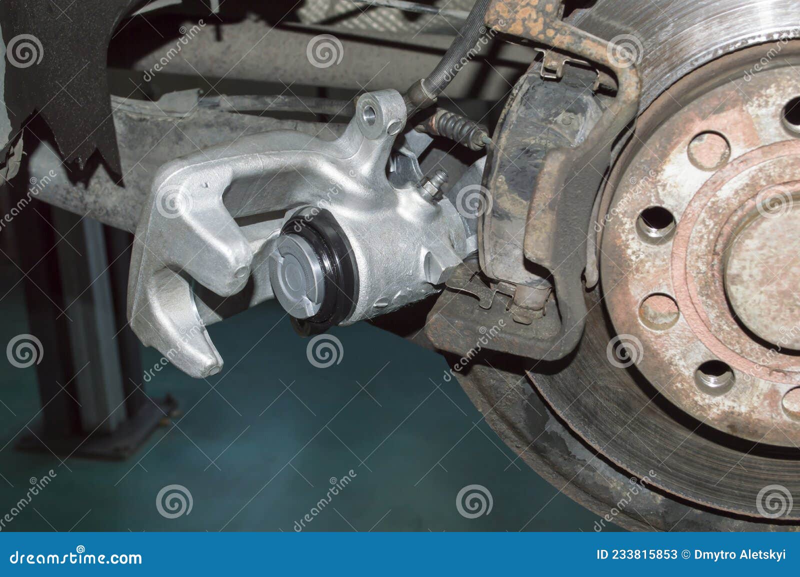 A New Brake Caliper, Partially Installed on the Car Stock Image Image