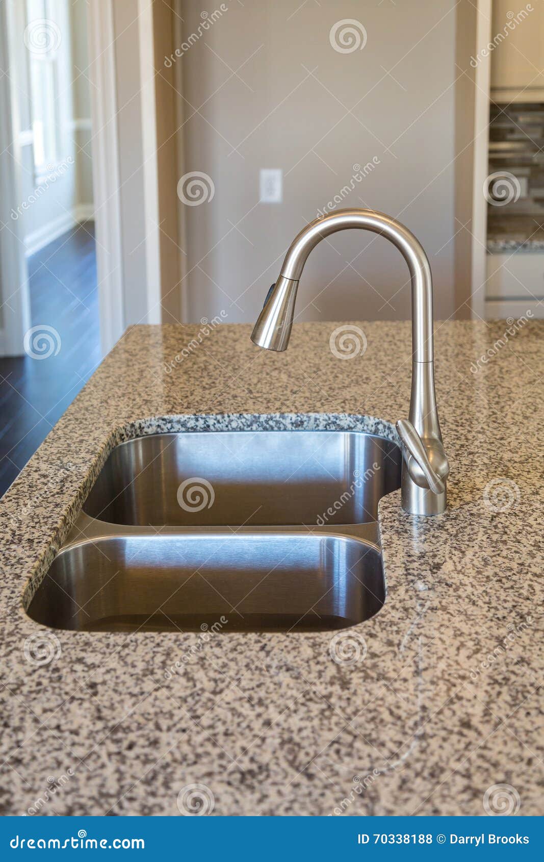 New Brushed Nickel Fixture on Granite Countertop Stock Photo - Image of ...