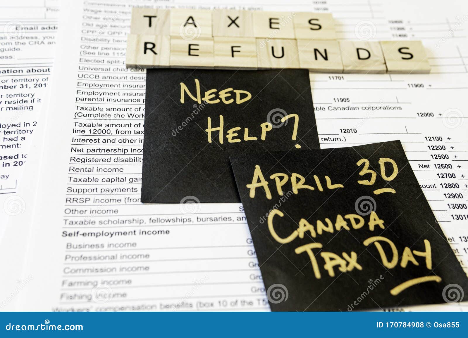 new-canadian-personal-tax-forms-and-letter-tiles-showing-refunds-and