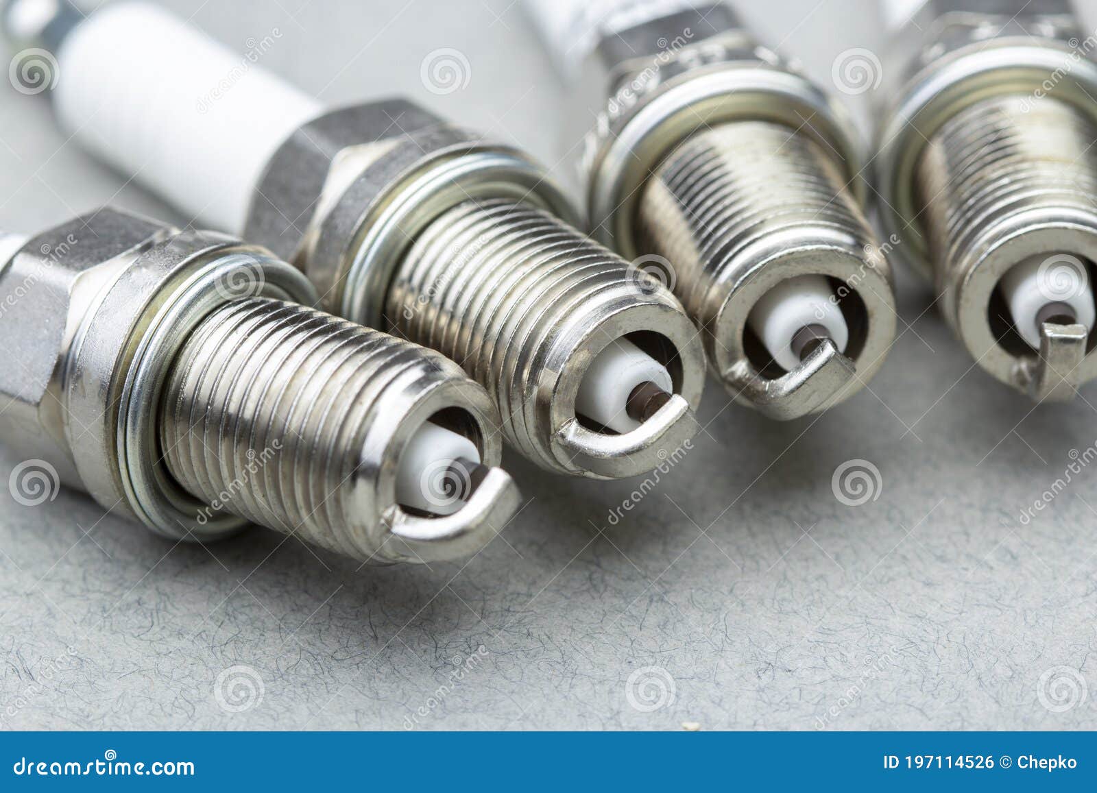 New Car Spark Plugs on Gray Background Stock Photo Image of