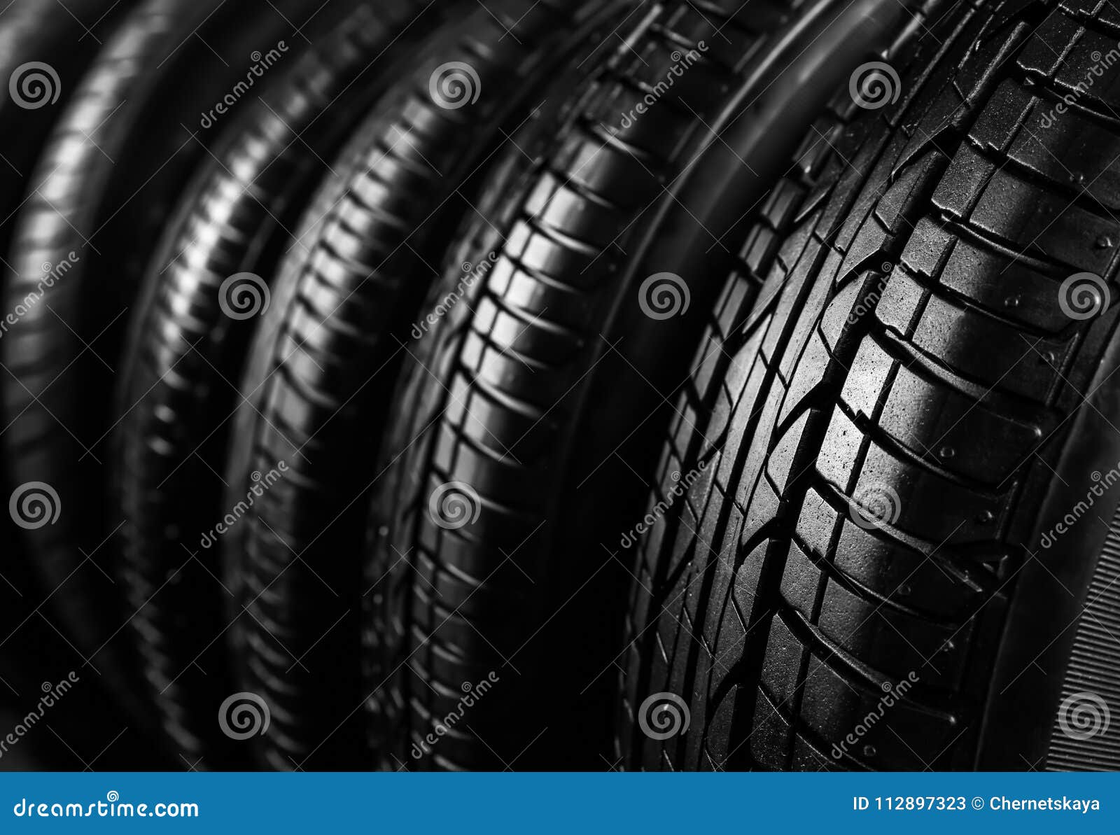New car tires, closeup stock image. Image of size, pattern 112897323