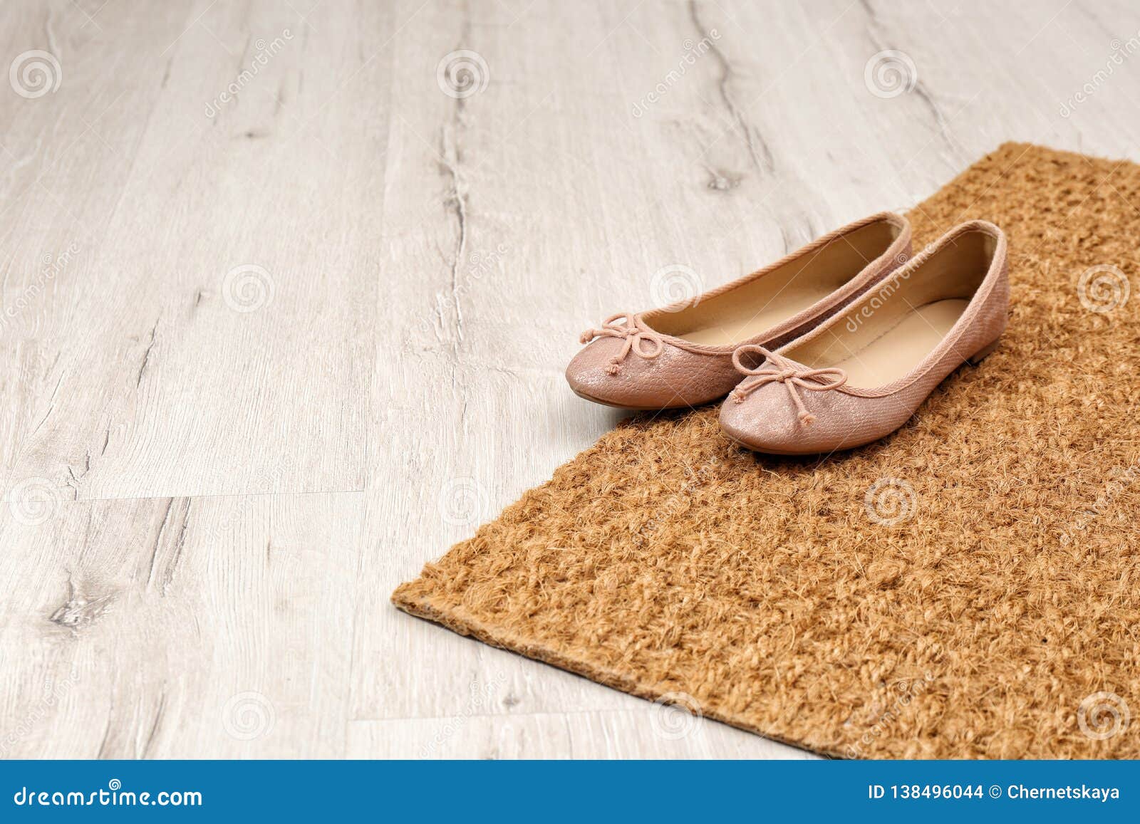 New Clean Doormat with Shoes on Floor Stock Photo - Image of doorstep ...